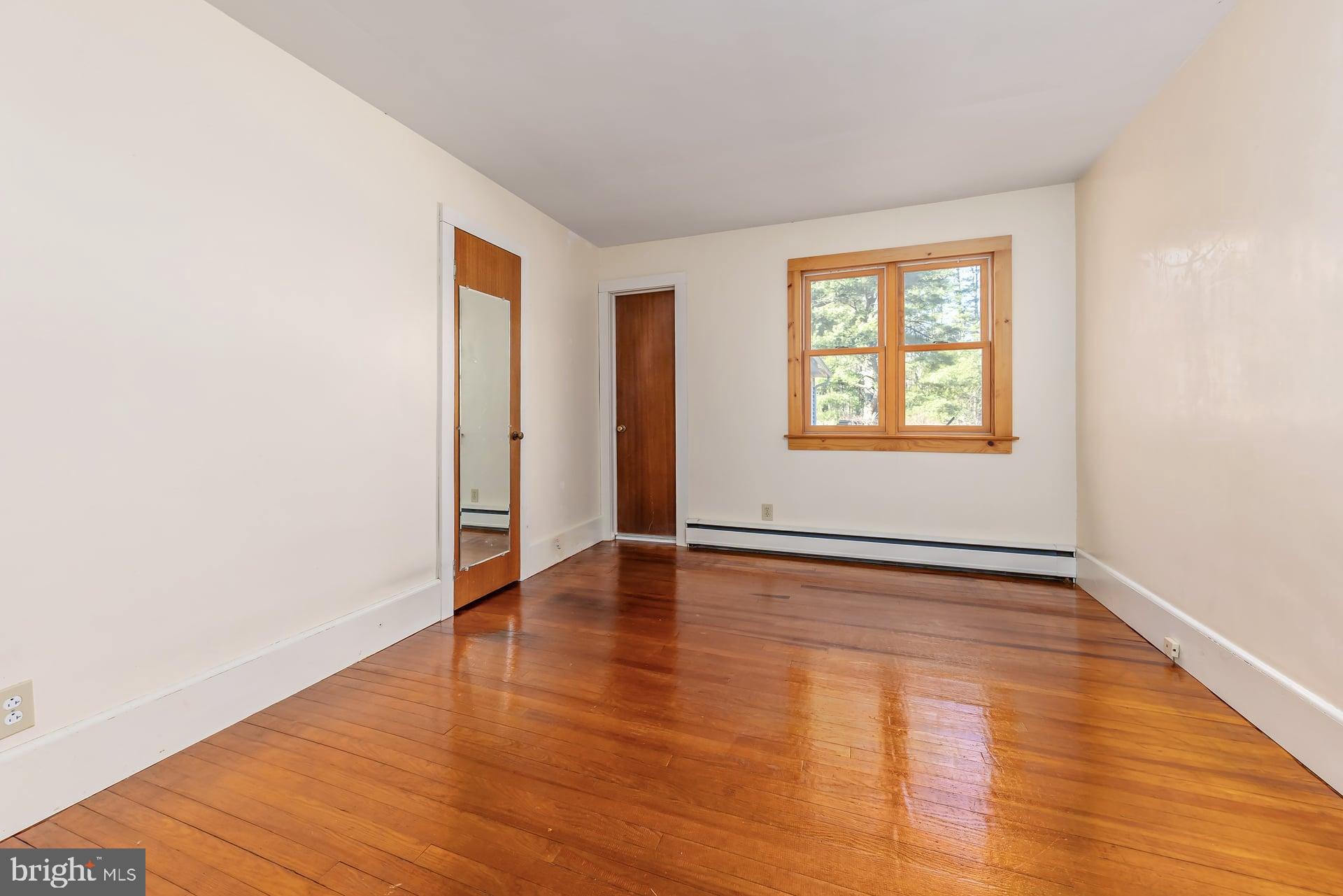 97 Alloway Aldine Road Alloway, NJ 08098 - Photo 16 of 52 Bright and airy space with warm wood floors.