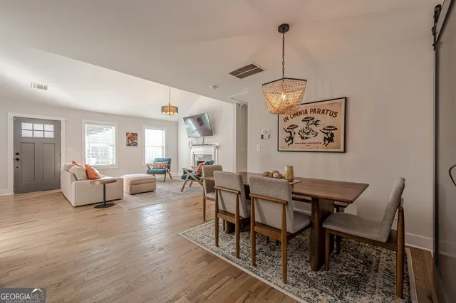 a view of a livingroom with furniture and window