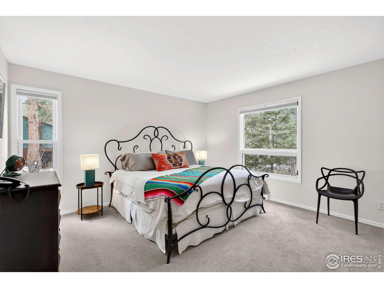 4 Porphyry View Jamestown, CO 80455 - Photo 11 of 34 a bedroom with a bed and a window