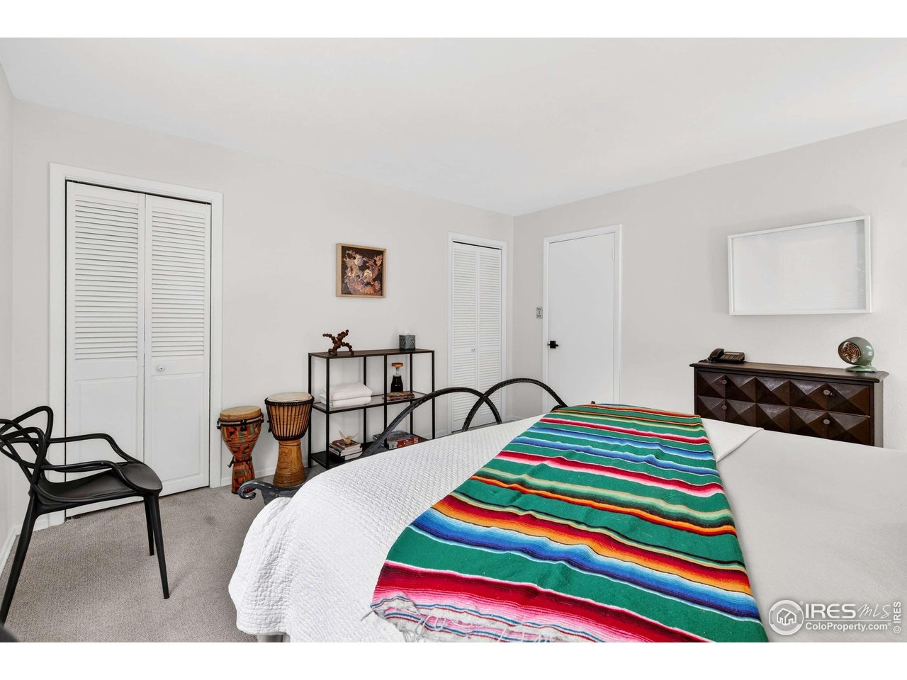 4 Porphyry View Jamestown, CO 80455 - Photo 12 of 34 a room that has a bed and a table in it