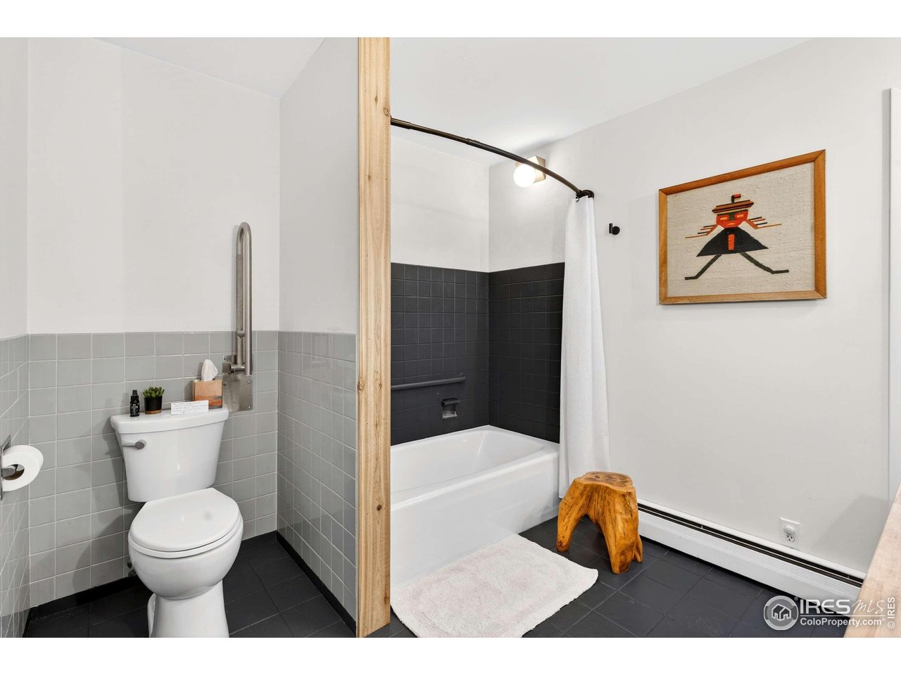 4 Porphyry View Jamestown, CO 80455 - Photo 14 of 34 a bathroom with a toilet a sink and shower