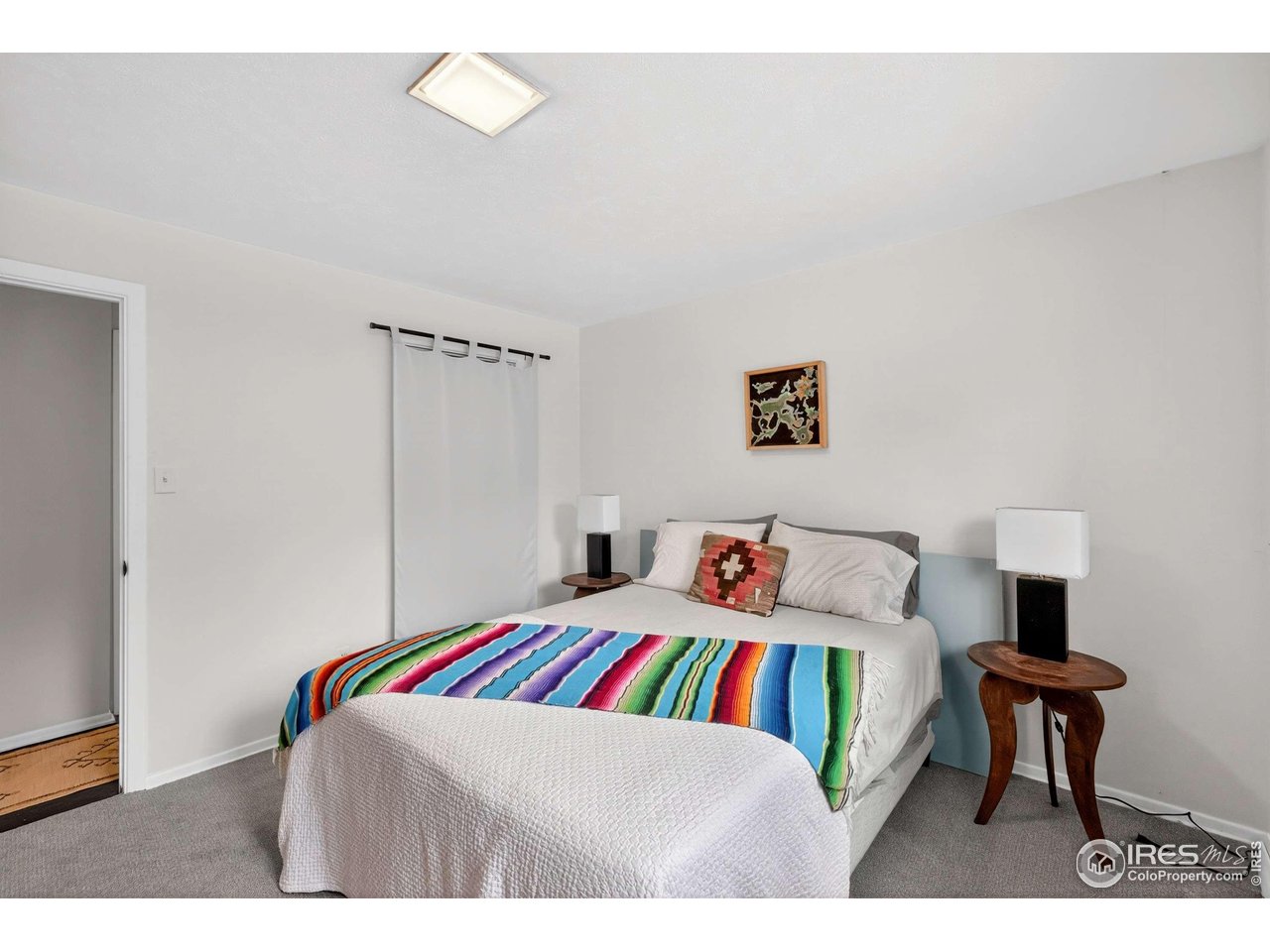 4 Porphyry View Jamestown, CO 80455 - Photo 16 of 34 a room that has a bed and a chair