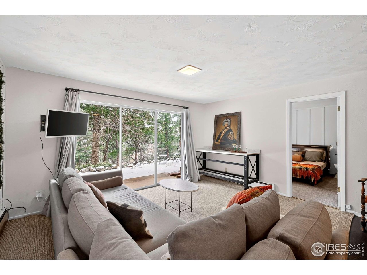 4 Porphyry View Jamestown, CO 80455 - Photo 19 of 34 a living room with furniture and a large window