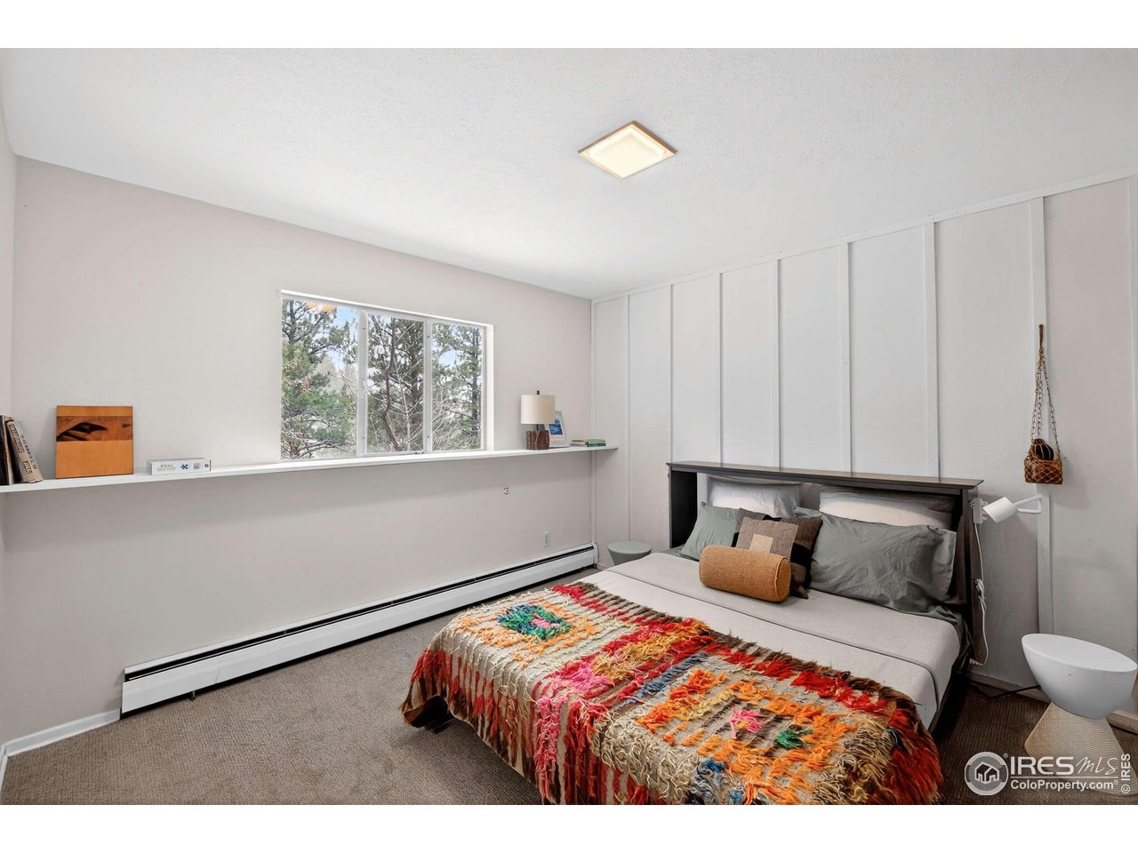 4 Porphyry View Jamestown, CO 80455 - Photo 20 of 34 a bedroom with a bed and a window