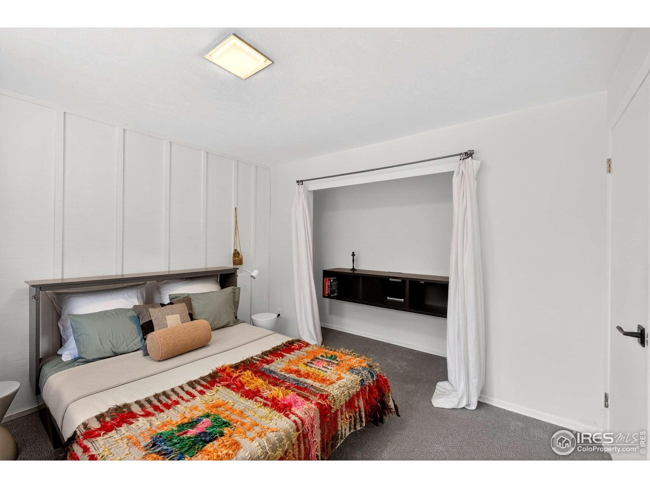 4 Porphyry View Jamestown, CO 80455 - Photo 21 of 34 a bedroom with a bed and window
