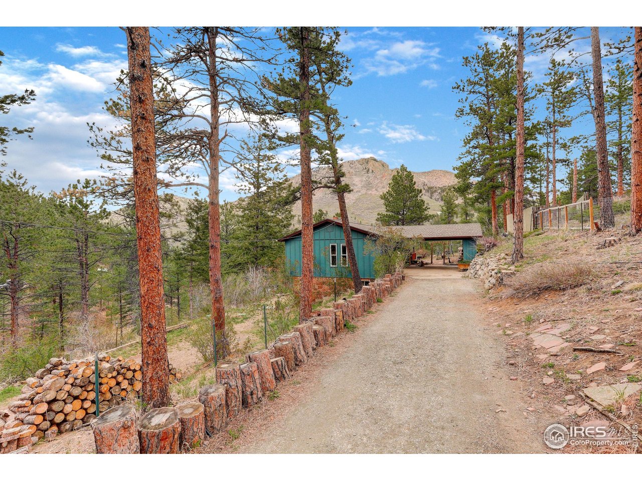 4 Porphyry View Jamestown, CO 80455 - Photo 27 of 34 a view of house with outdoor space