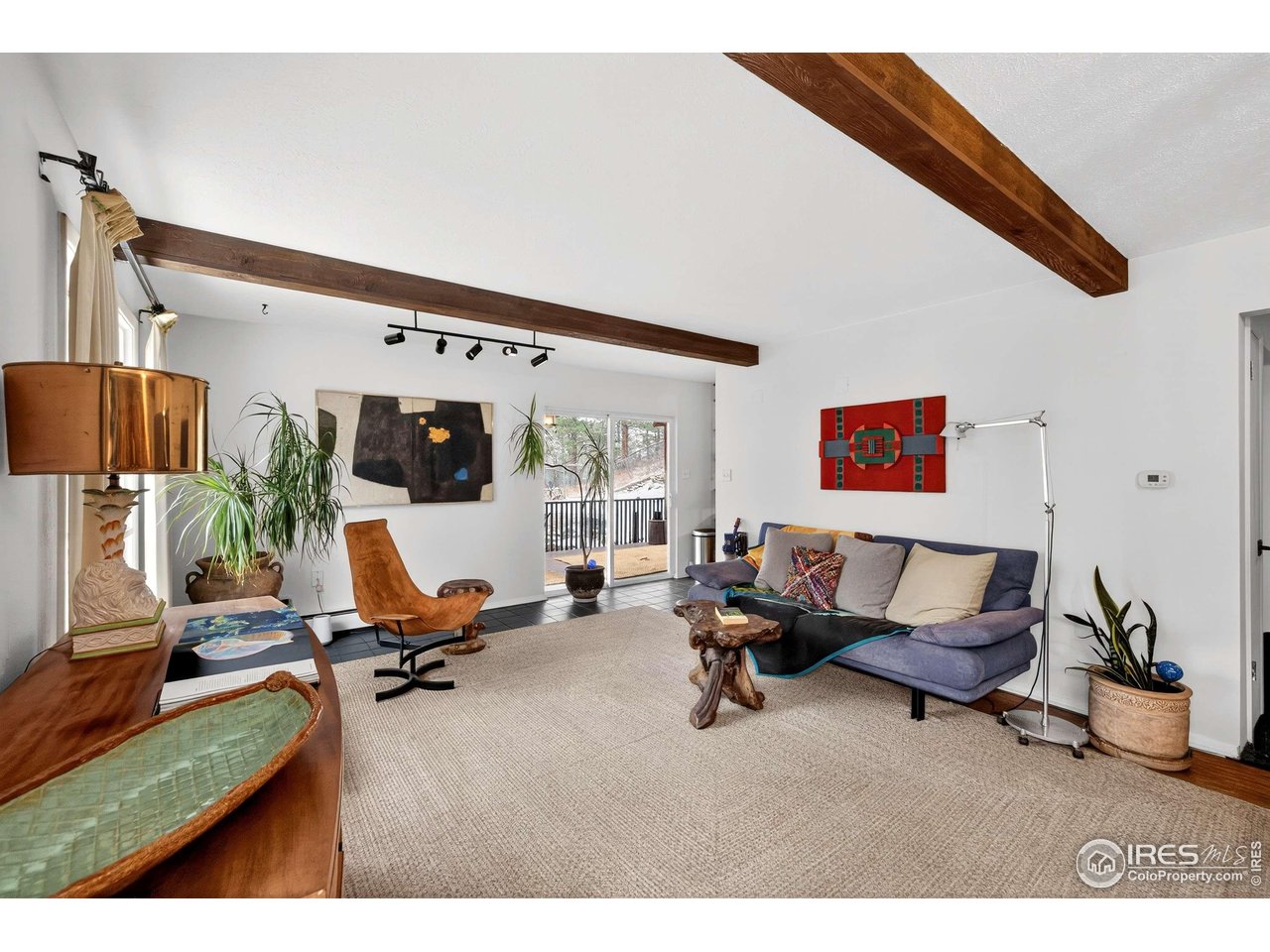 4 Porphyry View Jamestown, CO 80455 - Photo 7 of 34 a living room with furniture and flat screen tv