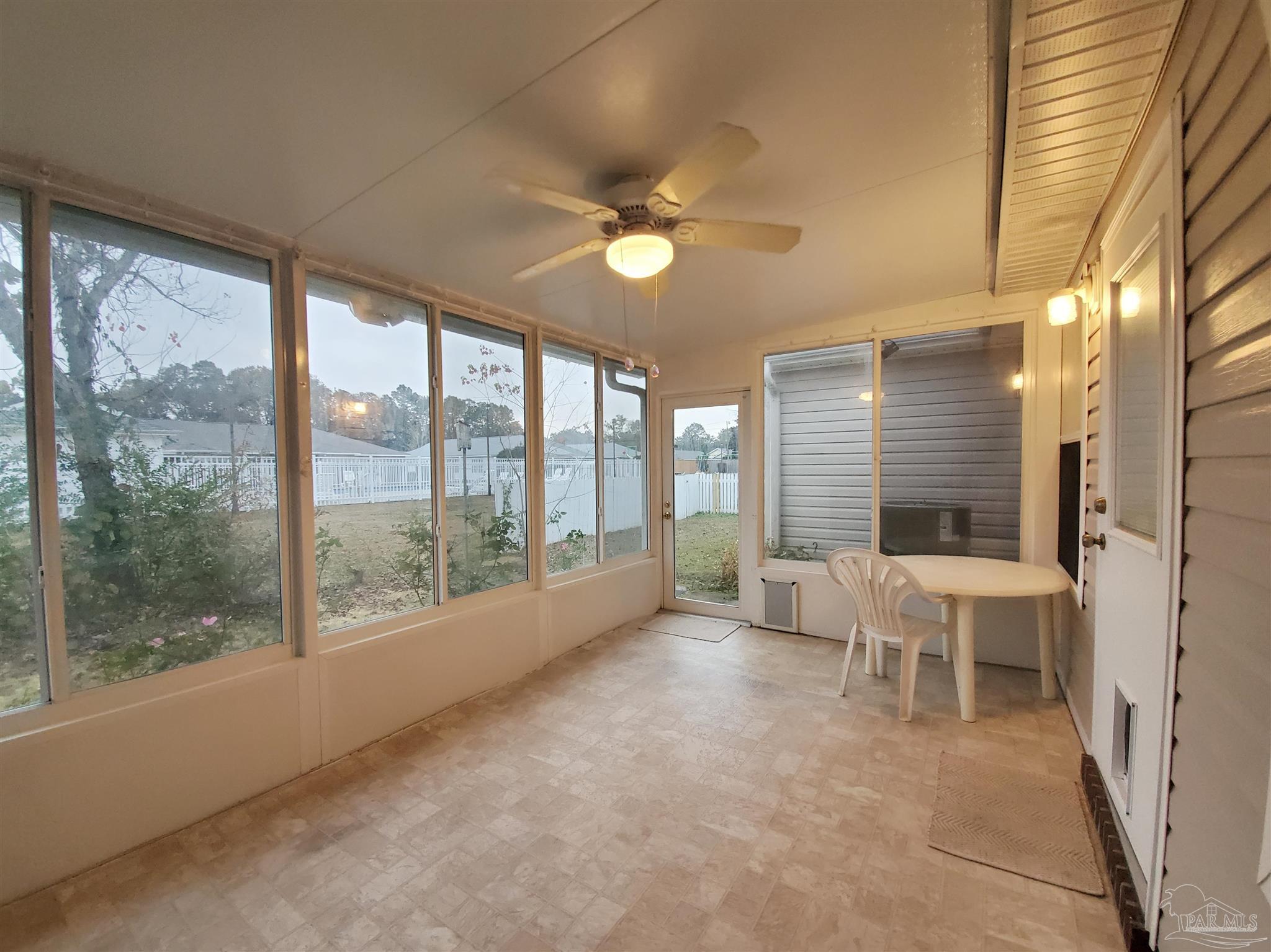 2527 Trailwood Drive Cantonment, FL 32533 - Photo 11 of 12 a living room with furniture and a large window
