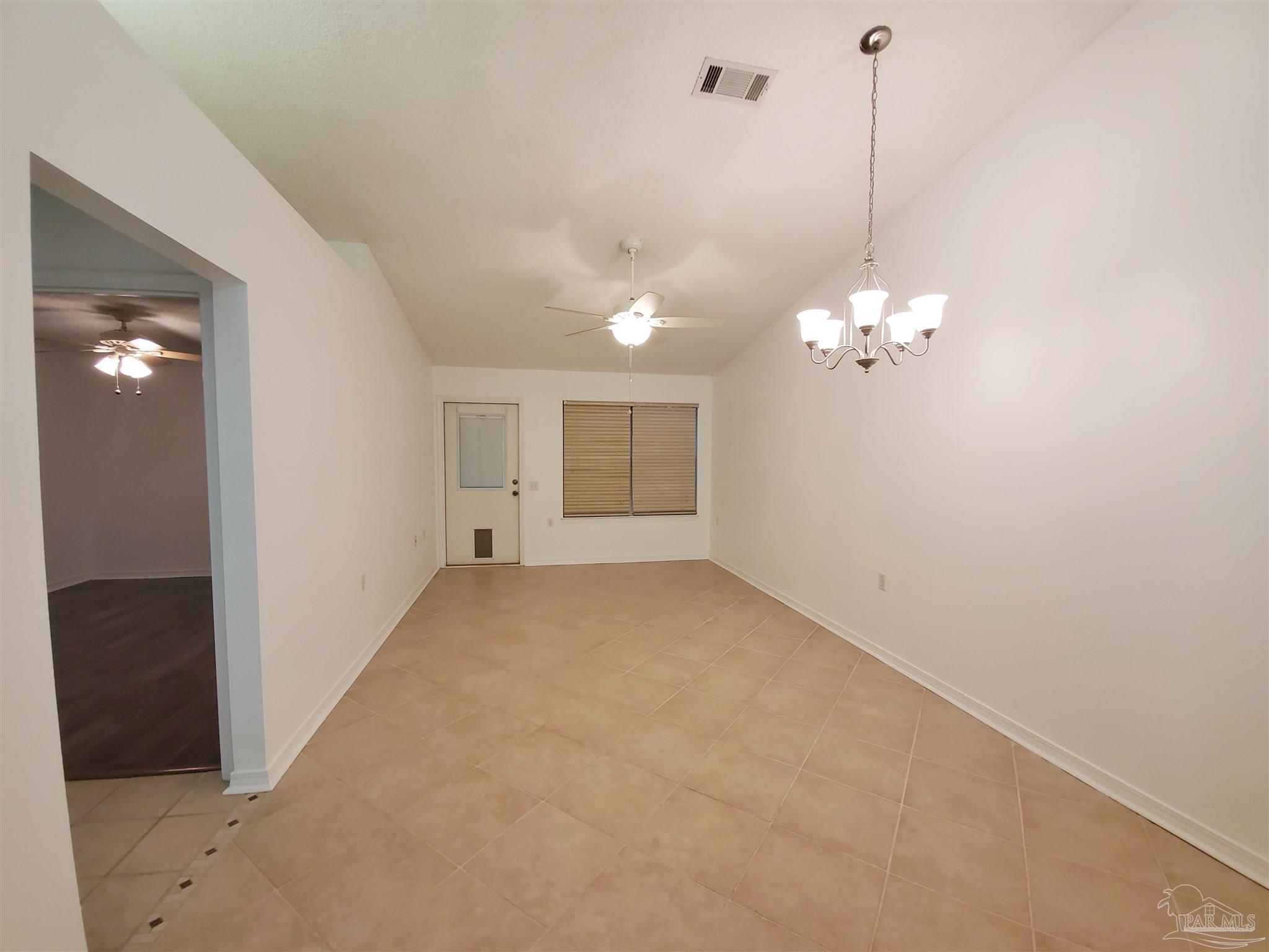 2527 Trailwood Drive Cantonment, FL 32533 - Photo 2 of 12 a view of a chandelier in big room and chandelier