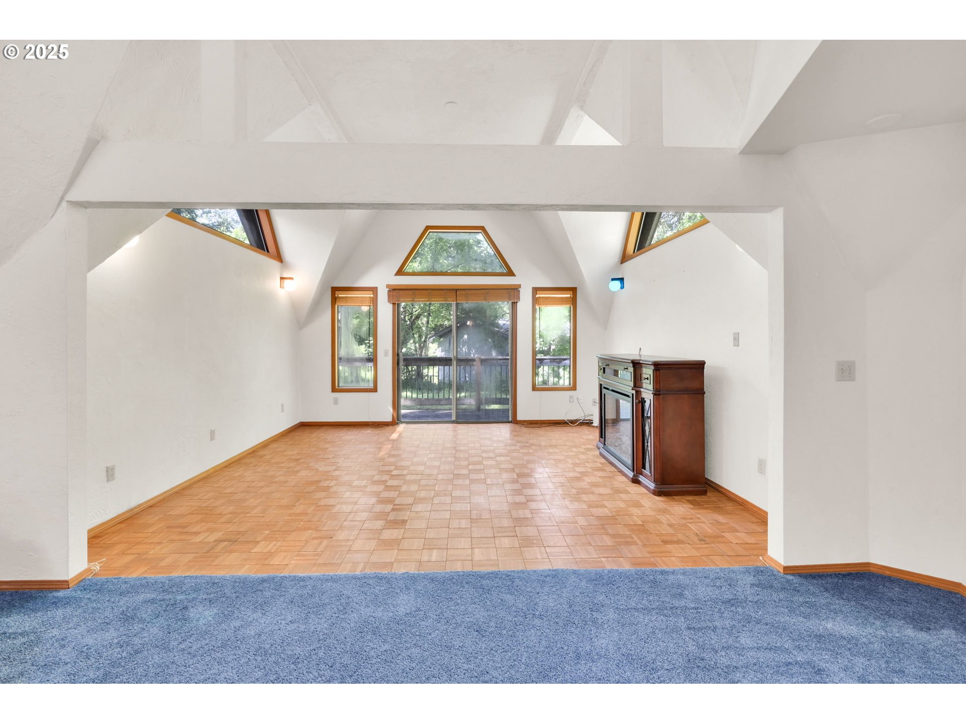 38383 Kickbusch Lane Springfield, OR 97478 - Photo 13 of 44 a view of an empty room with a window and wooden floor