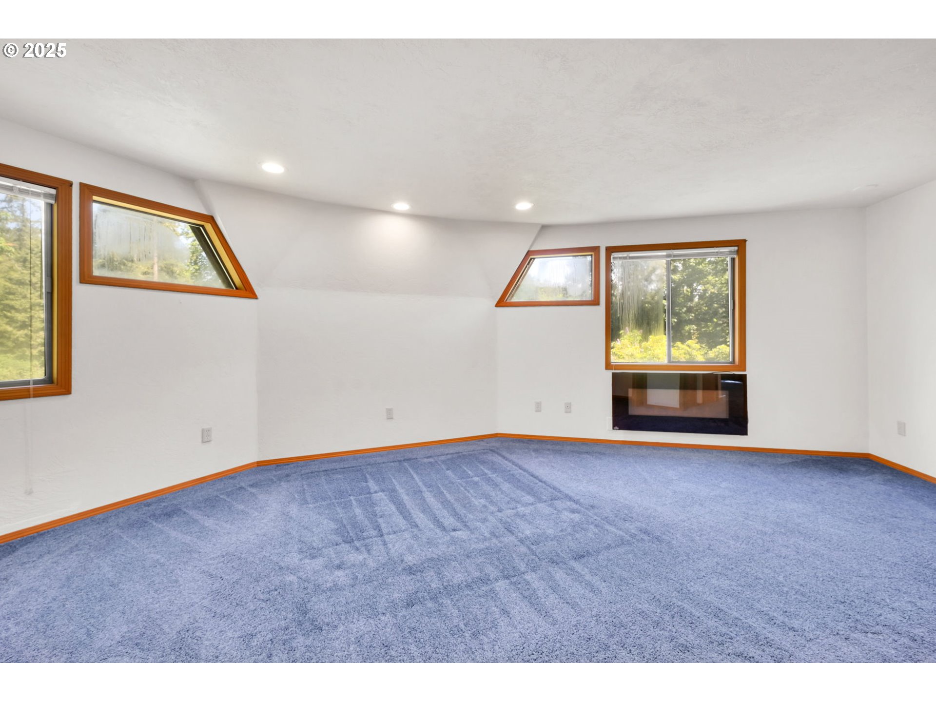 38383 Kickbusch Lane Springfield, OR 97478 - Photo 14 of 44 a view of an empty room with a window and wooden floor