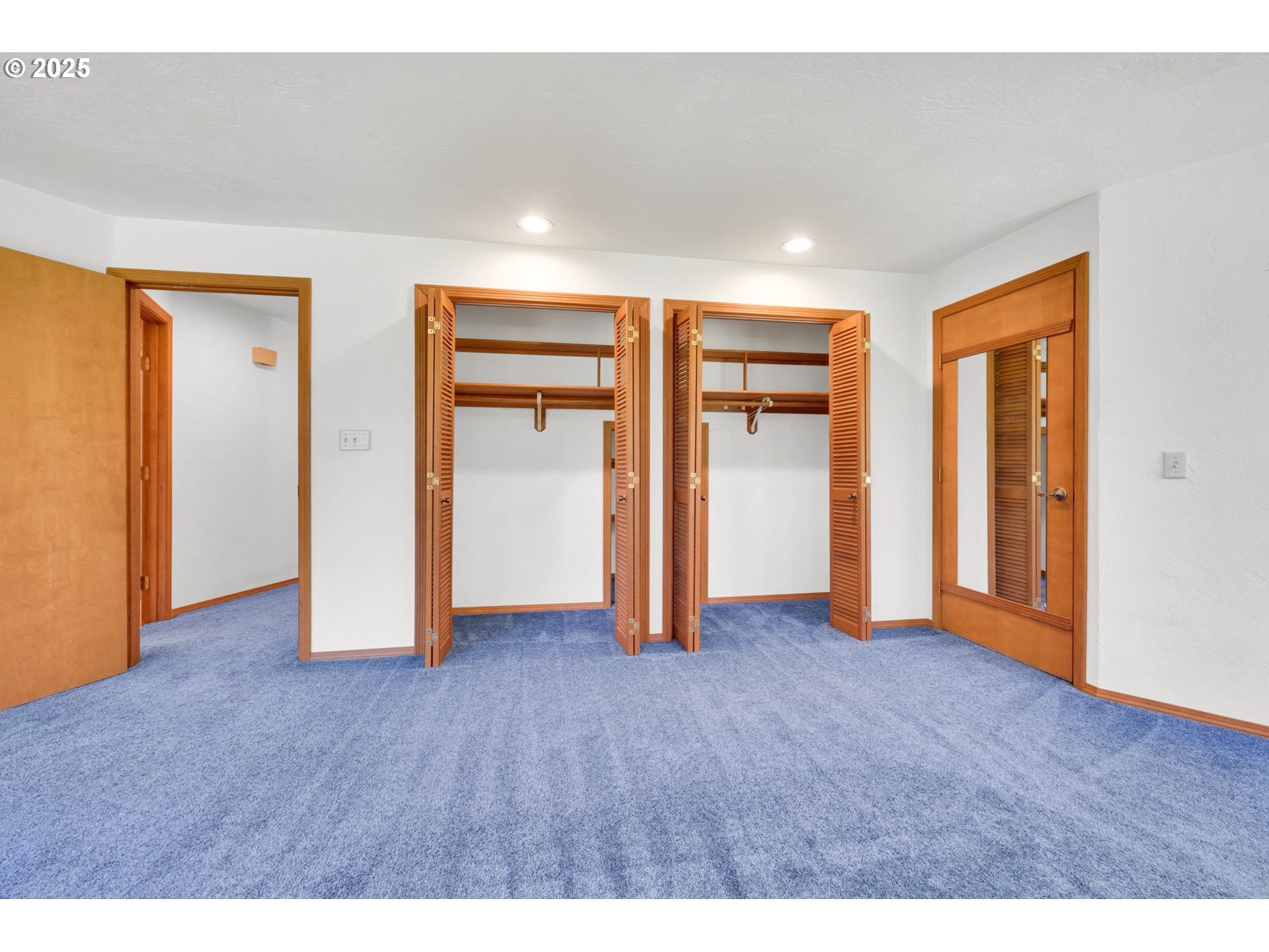 38383 Kickbusch Lane Springfield, OR 97478 - Photo 17 of 44 a view of an empty room with wooden floor and closet