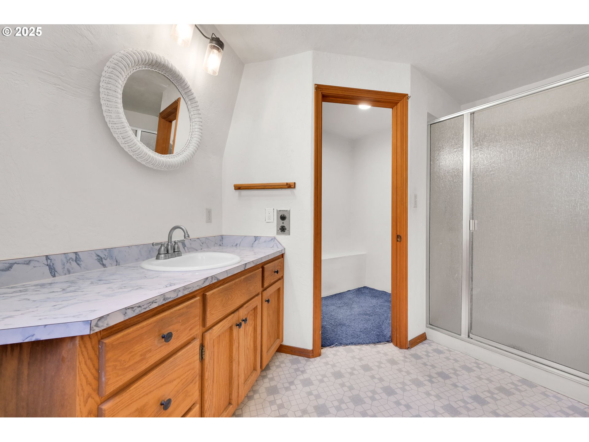 38383 Kickbusch Lane Springfield, OR 97478 - Photo 18 of 44 a bathroom with a sink and a mirror