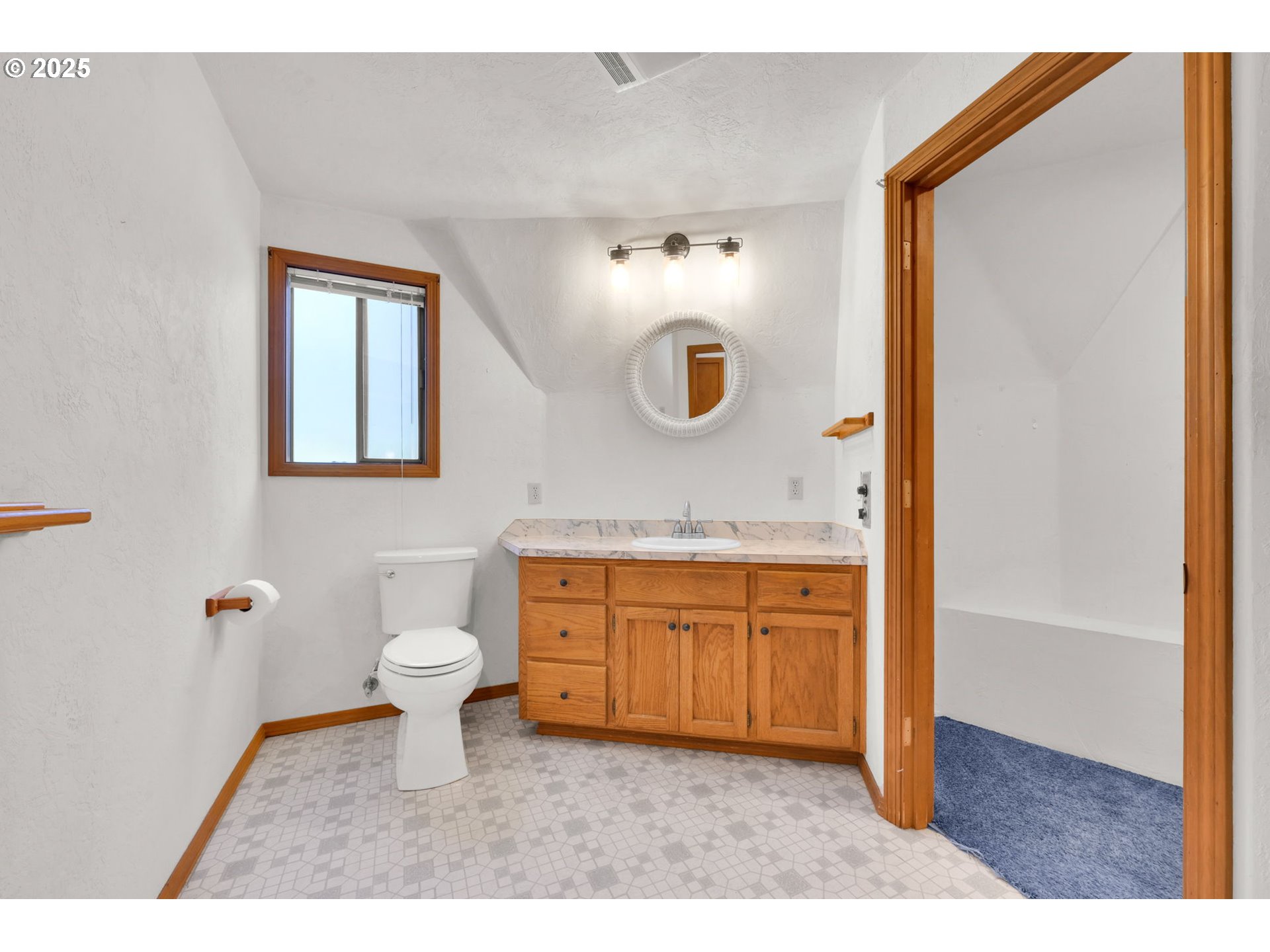 38383 Kickbusch Lane Springfield, OR 97478 - Photo 19 of 44 a bathroom with a granite countertop sink mirror and a bathtub