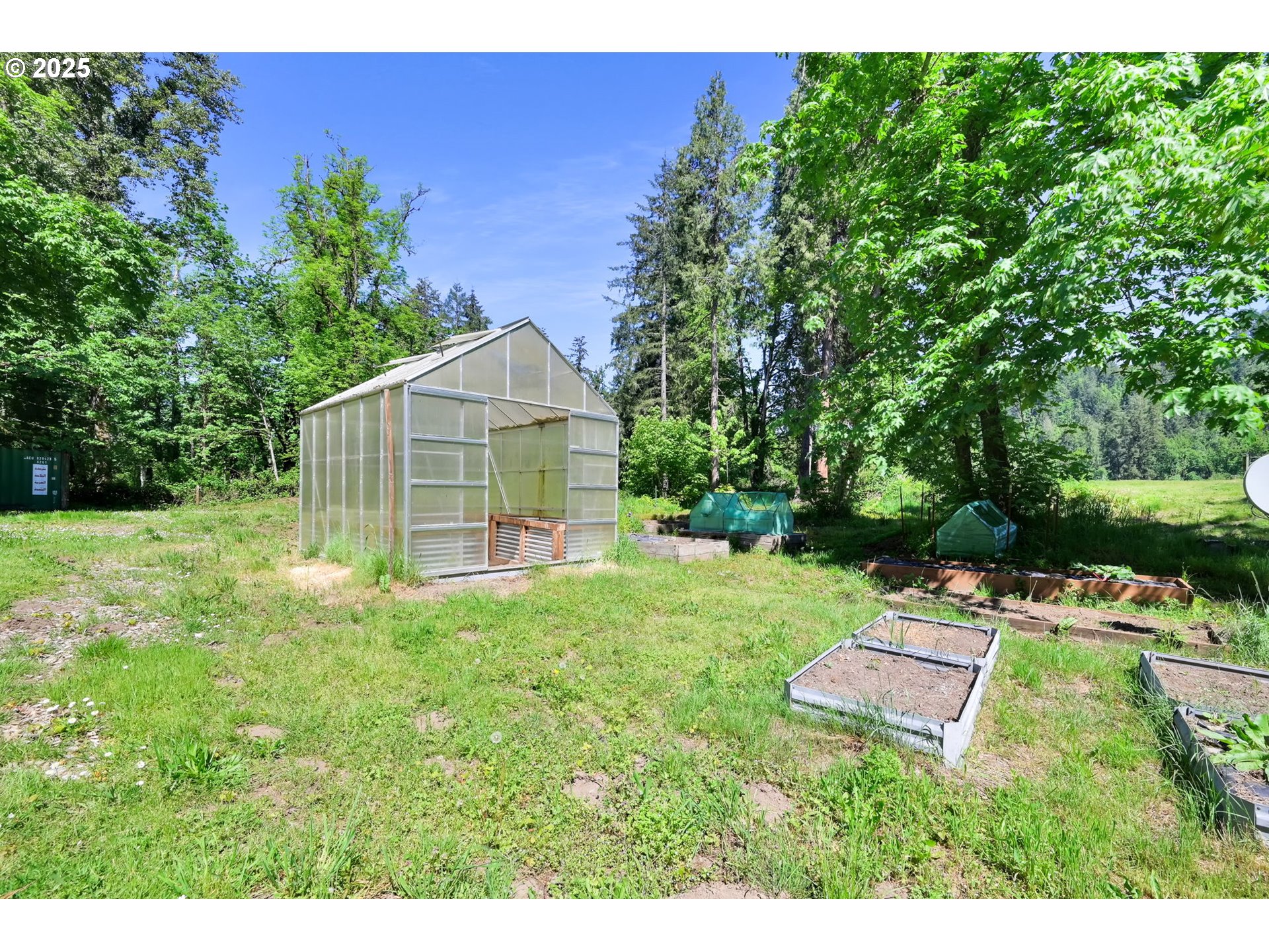 38383 Kickbusch Lane Springfield, OR 97478 - Photo 34 of 44 a view of a house with backyard and sitting area