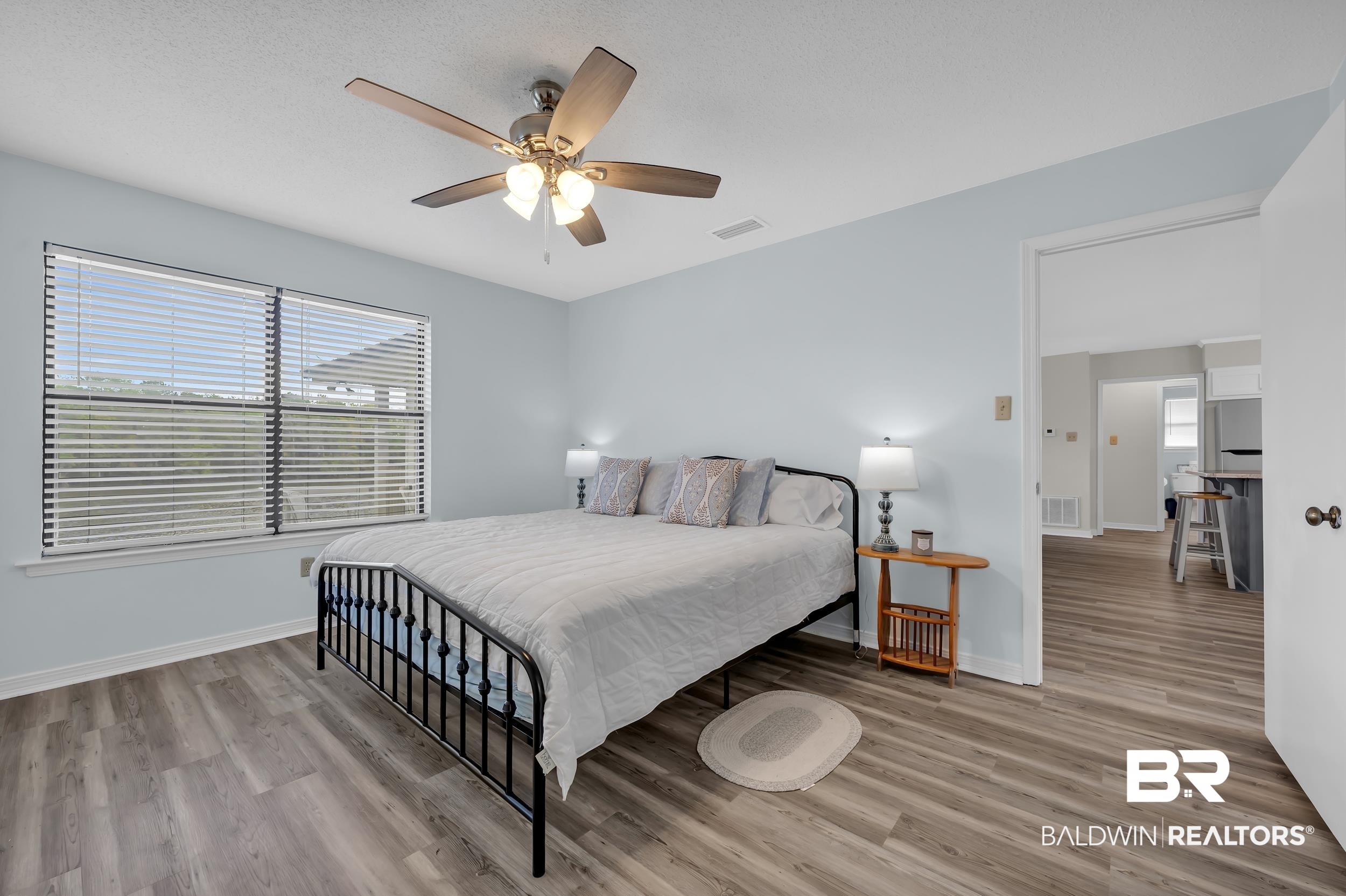 8081 Bryant's Lndg Road Stockton, AL 36579 - Photo 28 of 48 Bedroom featuring light wood-style flooring and ceiling fan