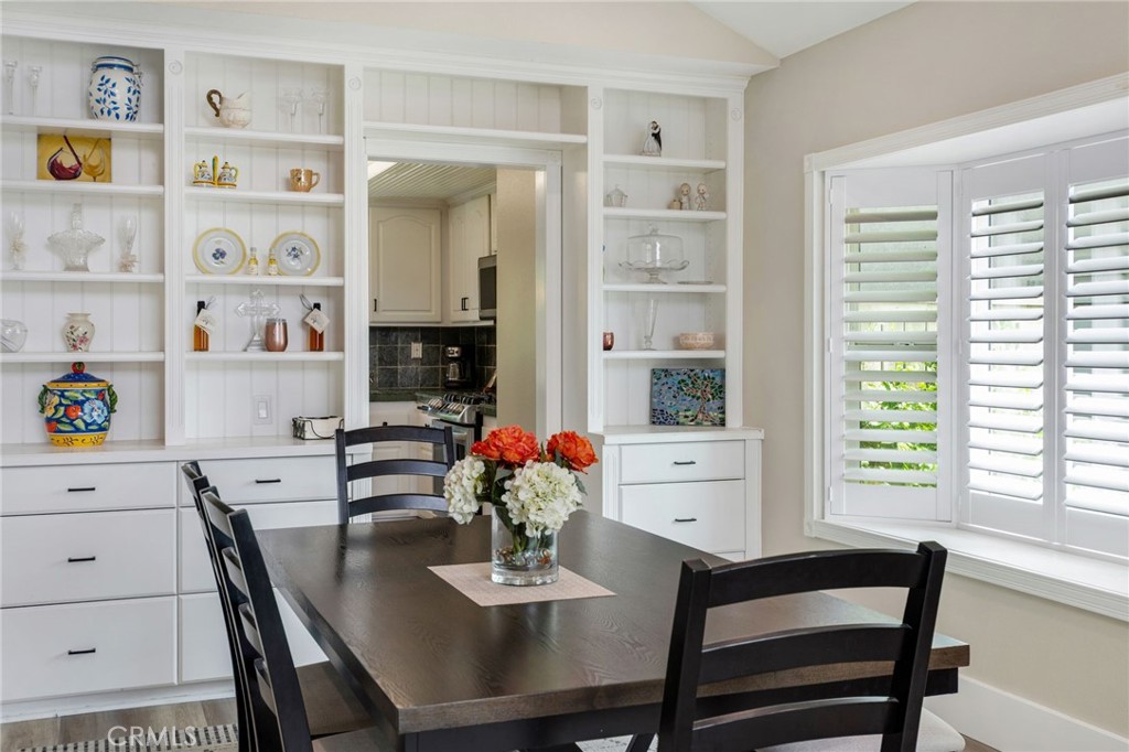 109 Cinnamon Ridge Road Brea, CA 92821 - Photo 18 of 67 Close up of dining room built in shelves and drawers leading into kitchen.