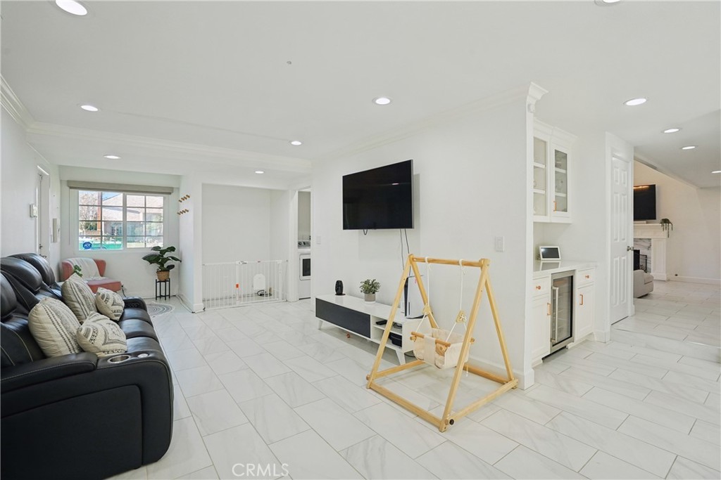 1446 Beechwood Drive Brea, CA 92821 - Photo 27 of 45 a living room with furniture and a flat screen tv