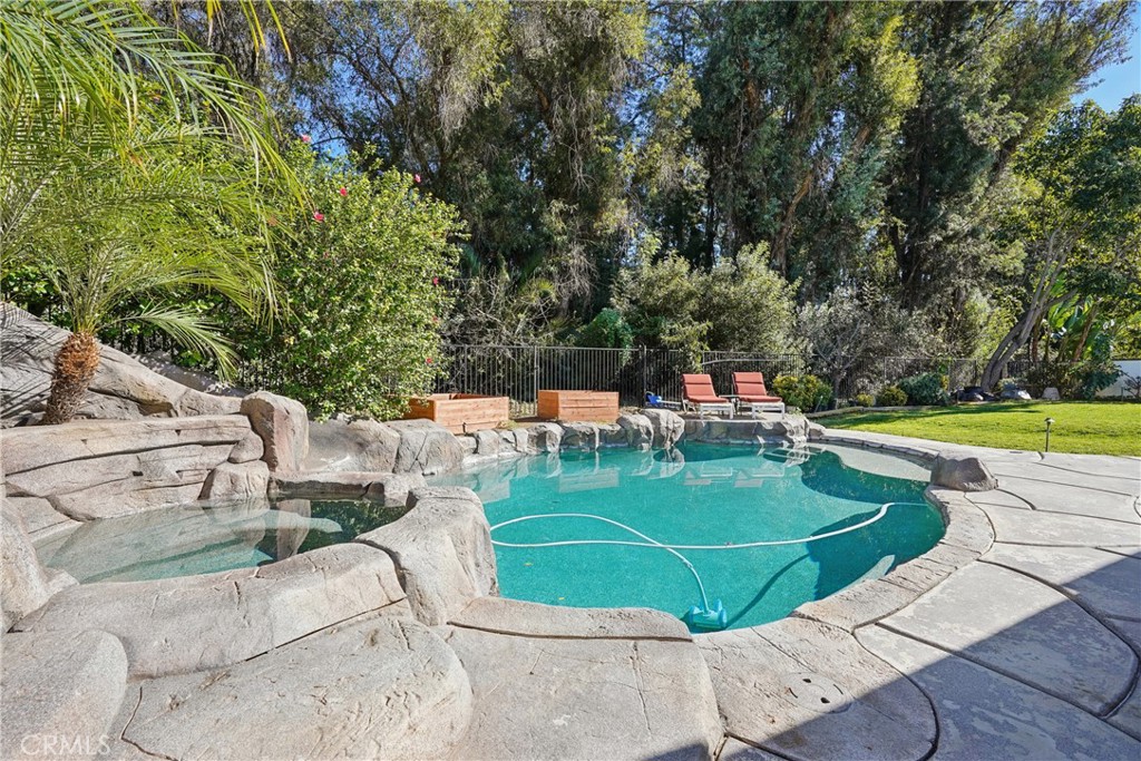 1446 Beechwood Drive Brea, CA 92821 - Photo 45 of 45 a view of a swimming pool with a chairs and tables