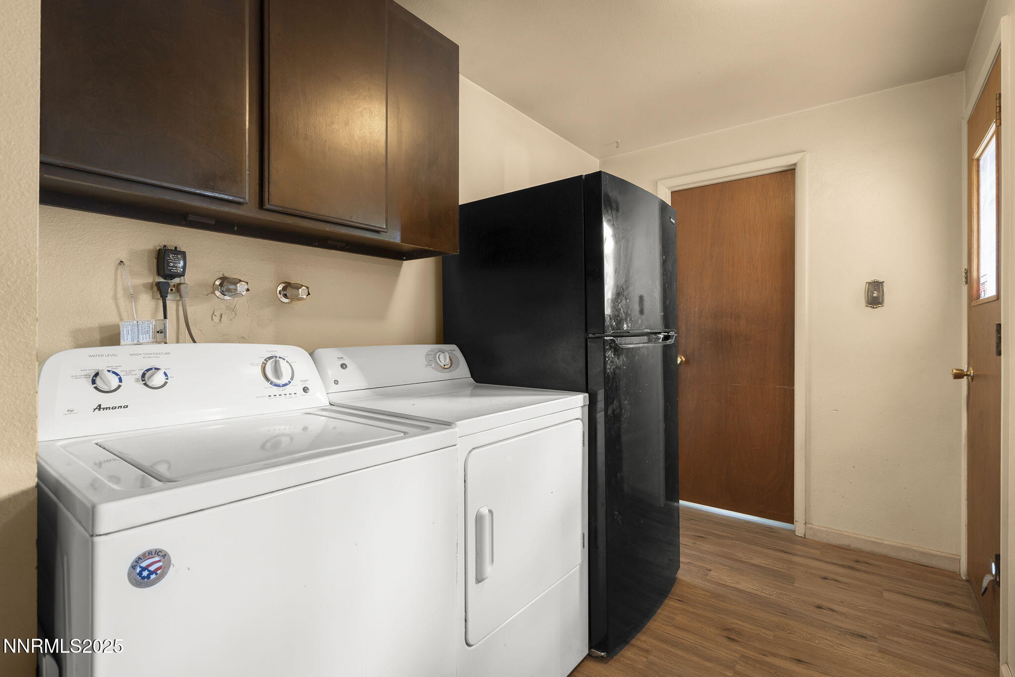 14590 Rancheros Drive Reno, NV 89521 - Photo 22 of 31 a utility room with dryer and washer