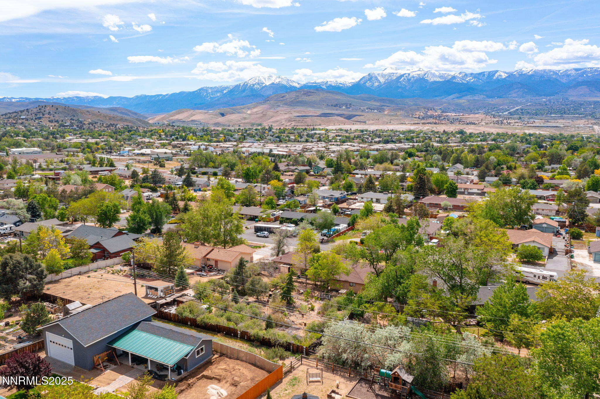 14590 Rancheros Drive Reno, NV 89521 - Photo 27 of 31 an aerial view of residential houses with outdoor space
