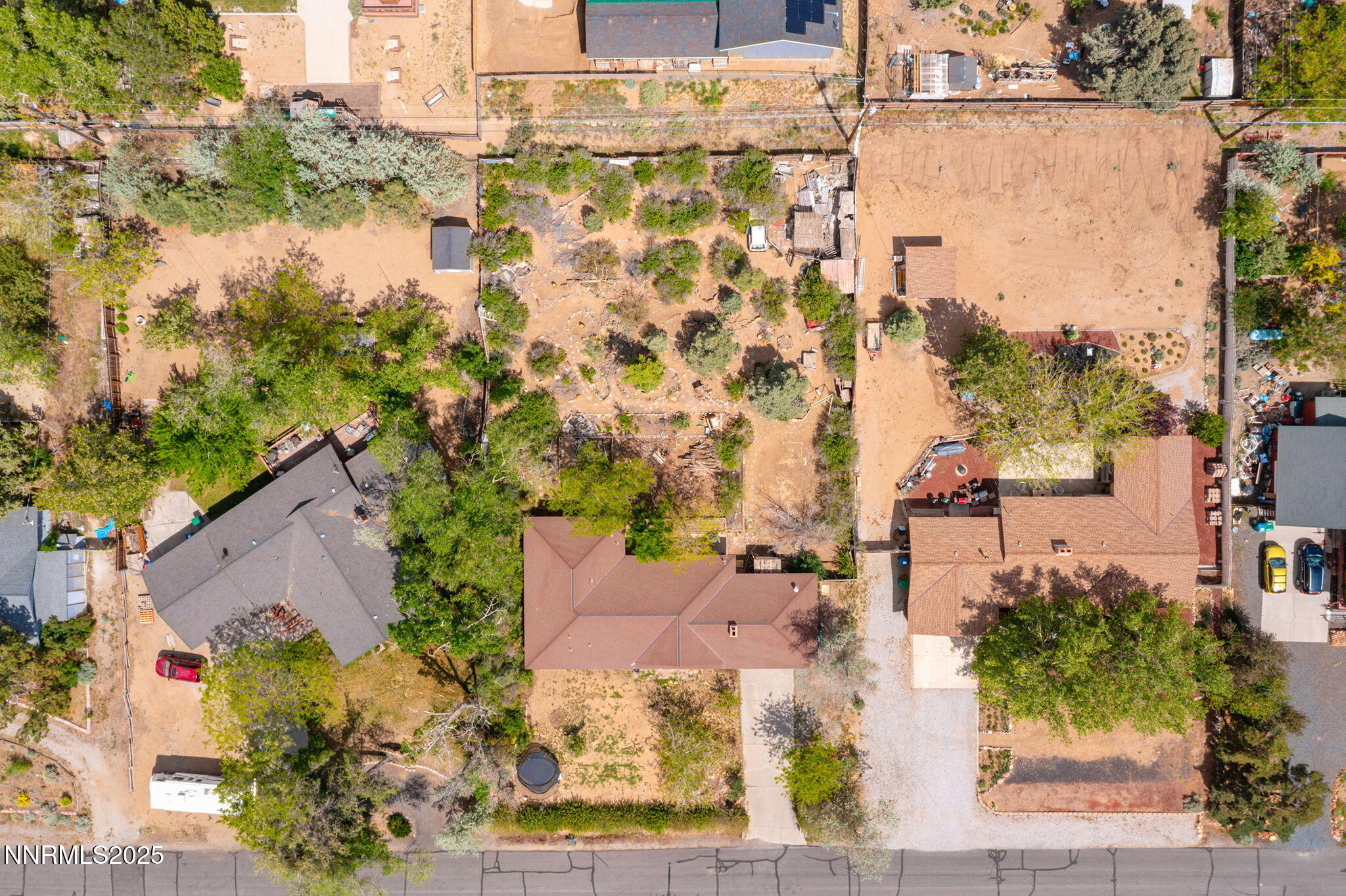 14590 Rancheros Drive Reno, NV 89521 - Photo 30 of 31 an aerial view of residential houses with outdoor space