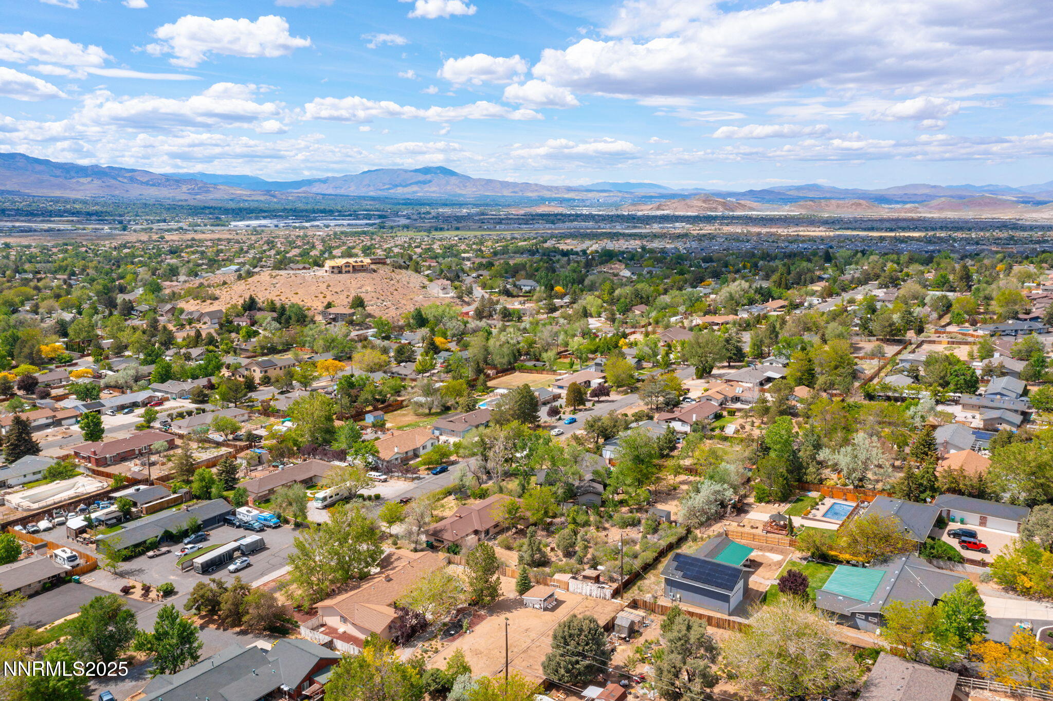 14590 Rancheros Drive Reno, NV 89521 - Photo 31 of 31 an aerial view of residential building with yard