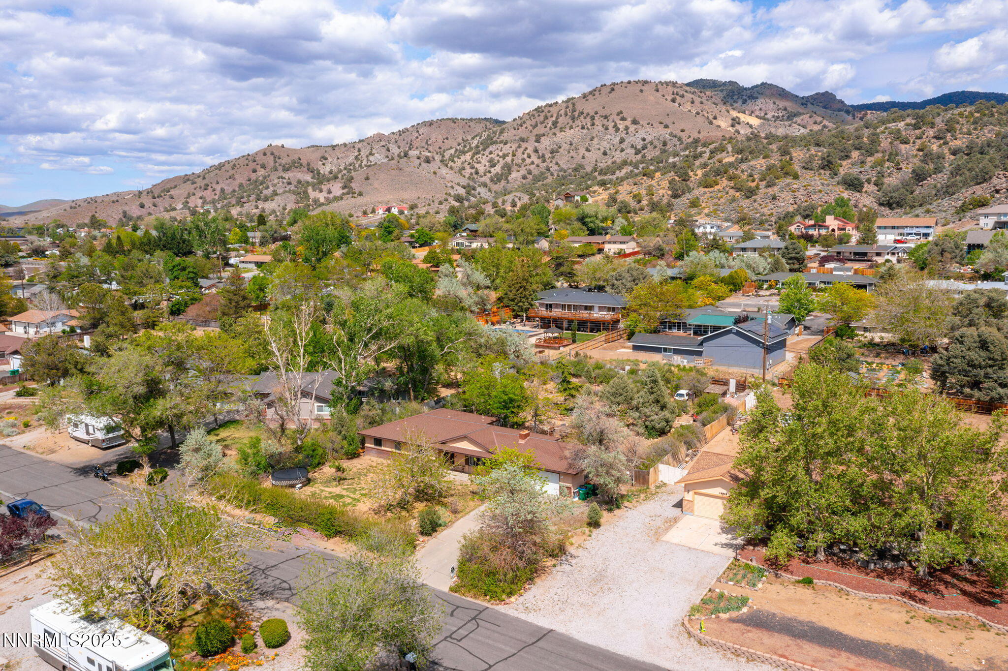 14590 Rancheros Drive Reno, NV 89521 - Photo 6 of 31 an aerial view of residential houses with outdoor space