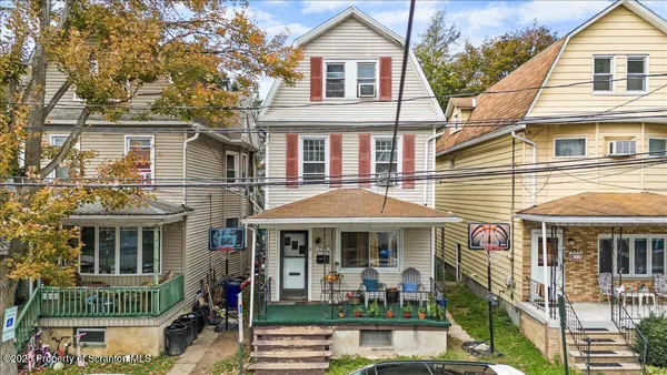 front view of a building with a porch