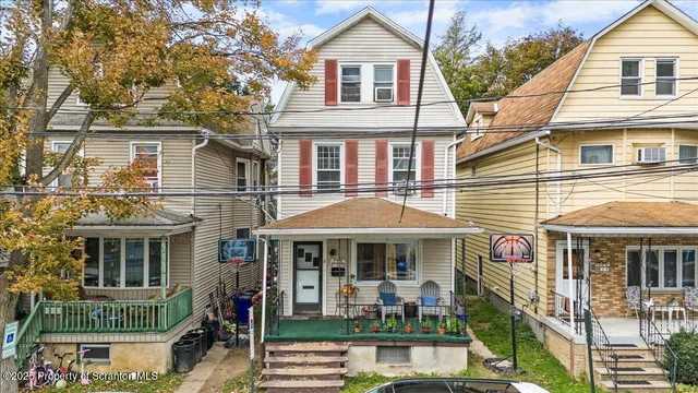front view of a building with a porch