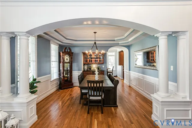a view of a room with furniture window and wooden floor