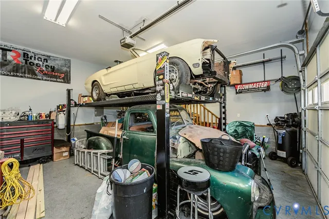 a view of a chairs and table in a room
