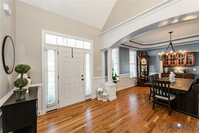 a view of a livingroom with furniture and wooden floor