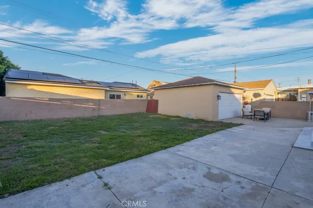 an aerial view of houses with yard