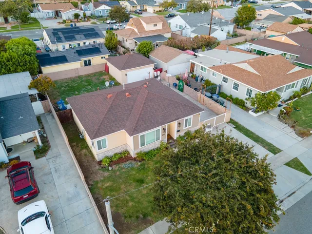 an aerial view of a house with a garden