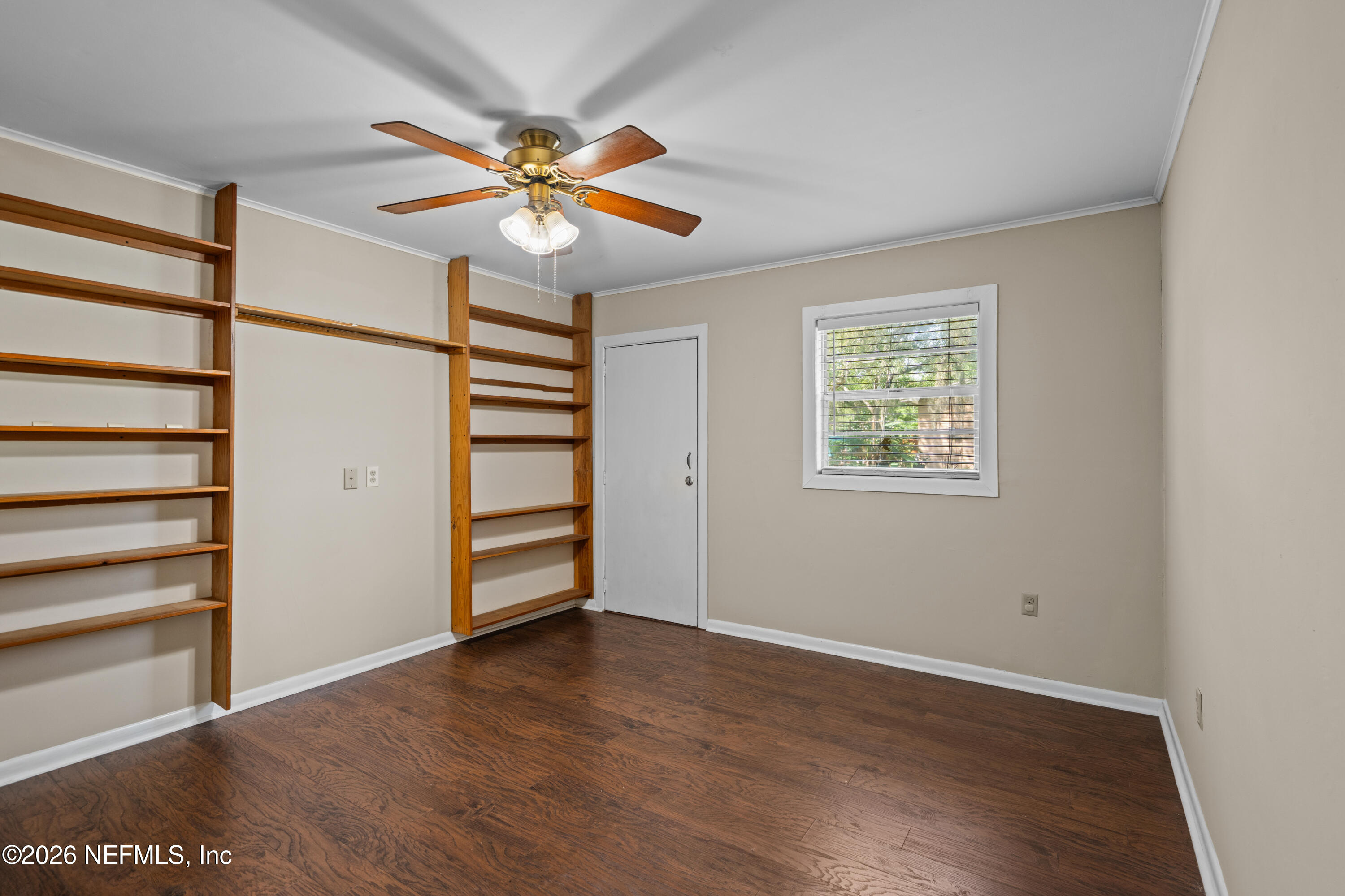 253 Cowry Road St. Augustine, FL 32086 - Photo 7 of 27 a view of an empty room with a window