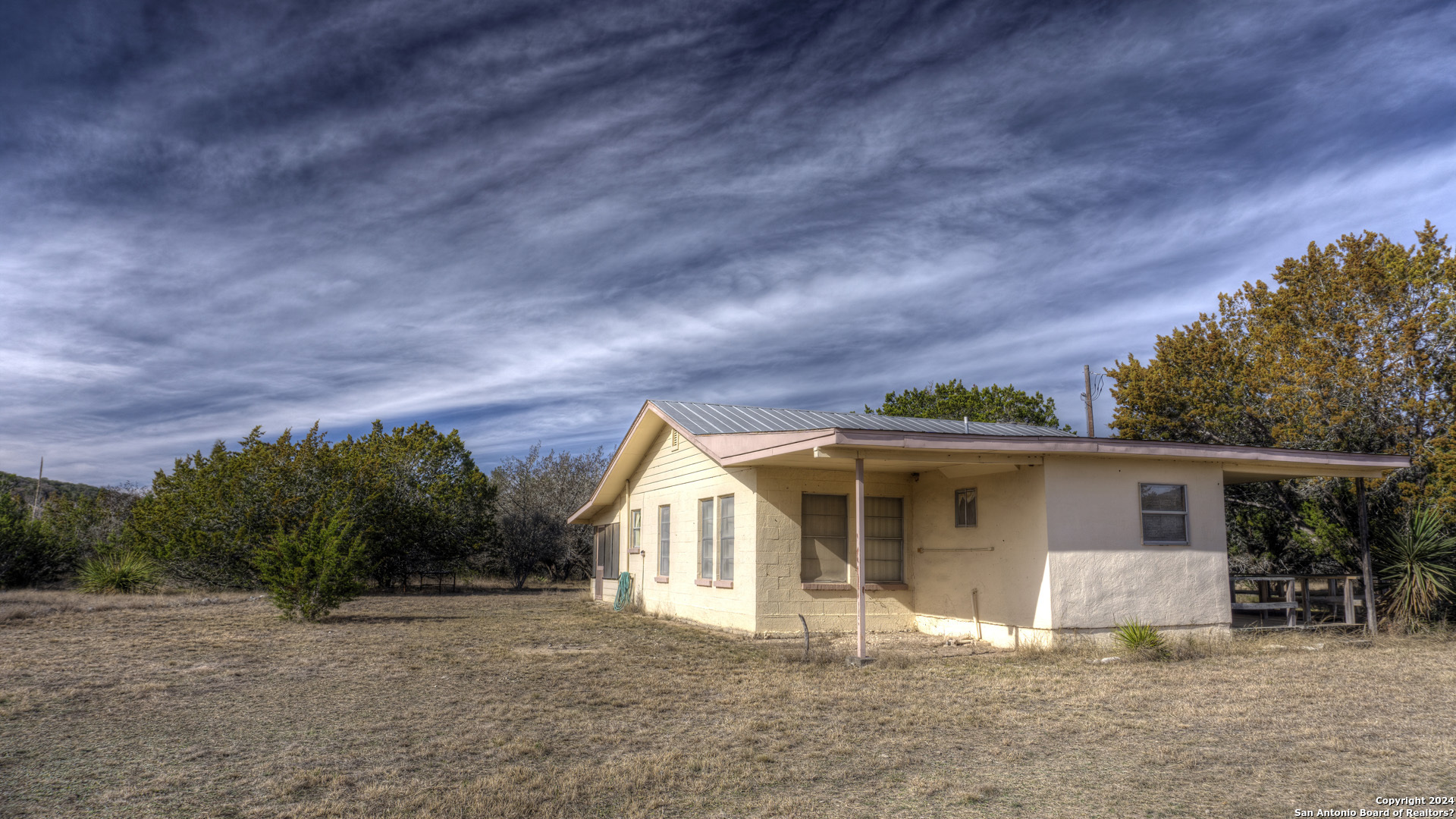 22 Squirrel Bend Uvalde, TX 78801 - Photo 1 of 47 front view of a house with a patio