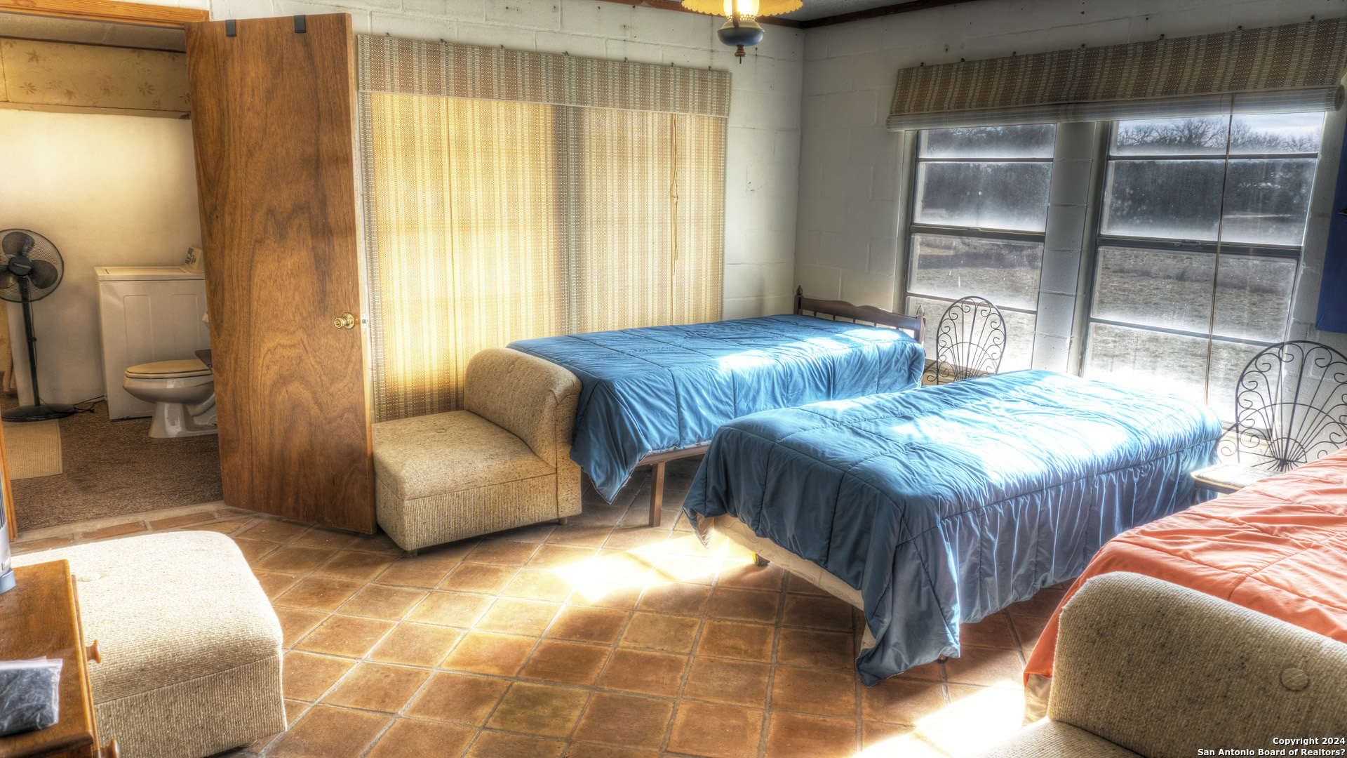 22 Squirrel Bend Uvalde, TX 78801 - Photo 32 of 47 a bedroom with double bed and a window