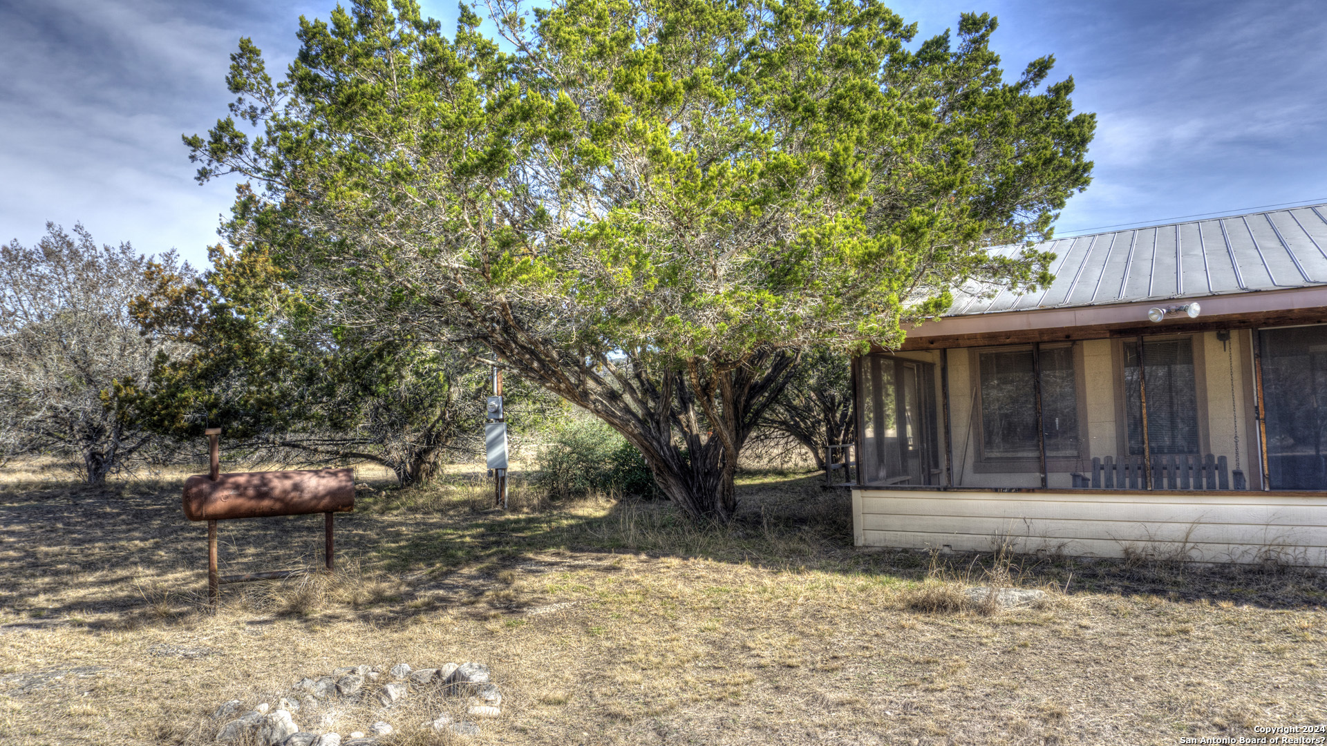 22 Squirrel Bend Uvalde, TX 78801 - Photo 8 of 47 a view of a house with a yard