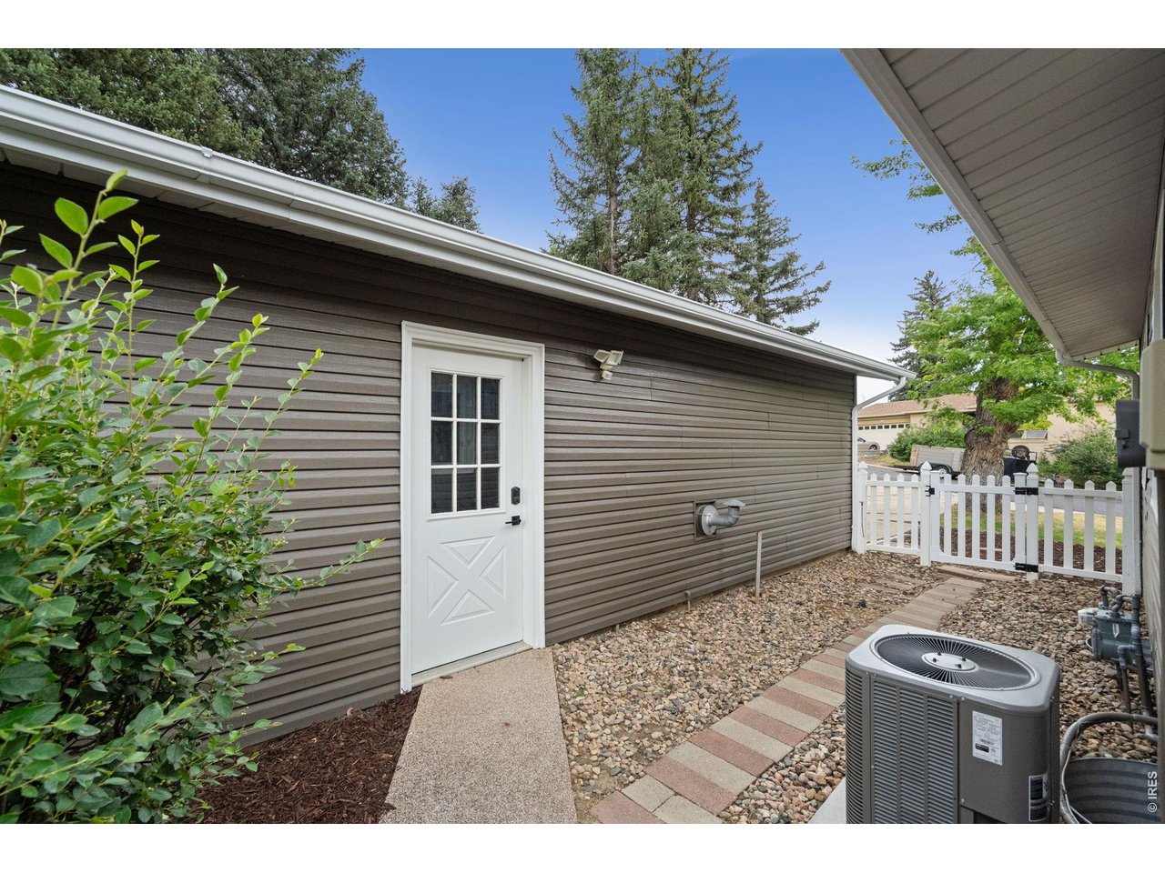 1118 Ridgelawn Drive Fort Collins, CO 80521 - Photo 40 of 48 Steps from the Patio is a side door entrance to the huge Garage