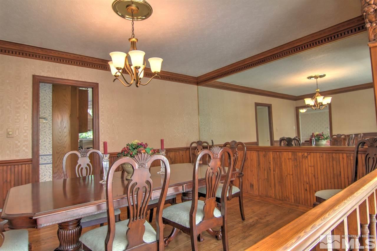 2340 Watt Street Reno, NV 89509 - Photo 8 of 25 a view of a dining room with furniture and chandelier
