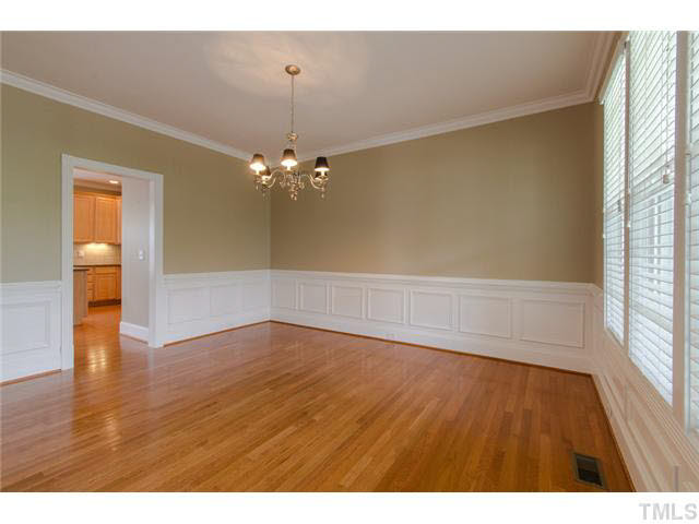 Holidays will be better than ever when your serve in your Formal Dining Room, connecting your Kitchen through the Butler's Pantry with hardwoods, painted wainscoting, chair rail & 2 Piece Crown moldings throughout. Dining Room