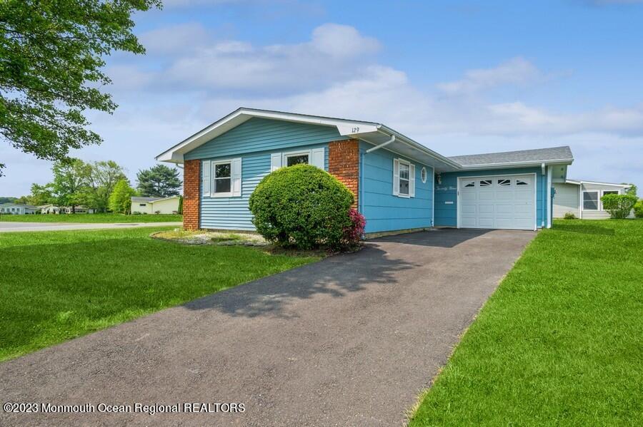 129 Whittier Road Brick, NJ 08724 - Photo 2 of 23 02_129WhittierRd_300_FrontView_LowRes