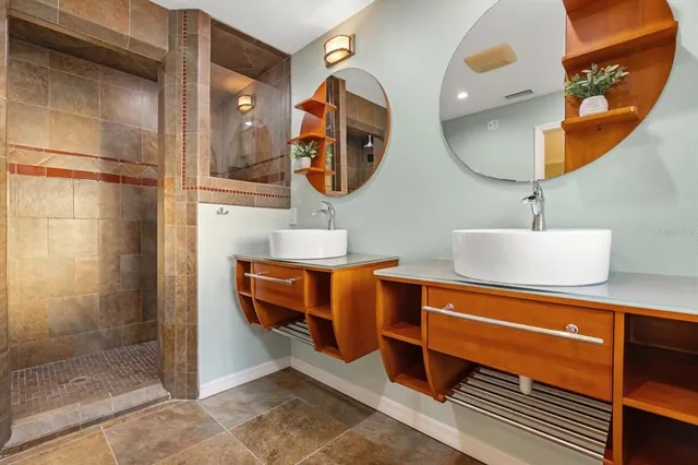 a bathroom with a sink and a mirror