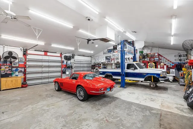 a view of a backyard with a garden and trees