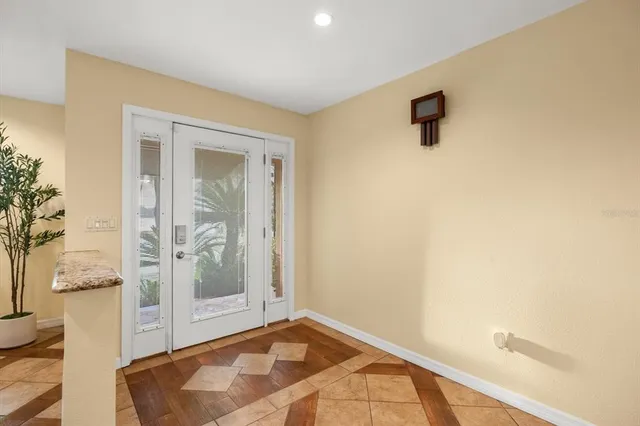 a view of livingroom with floor to ceiling window and wooden floor