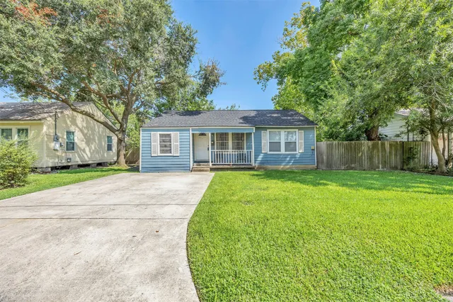front view of a house and a yard