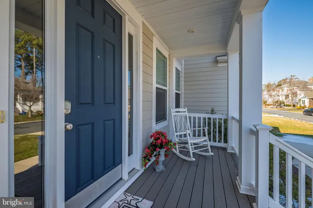 a view of a house with backyard and swimming pool