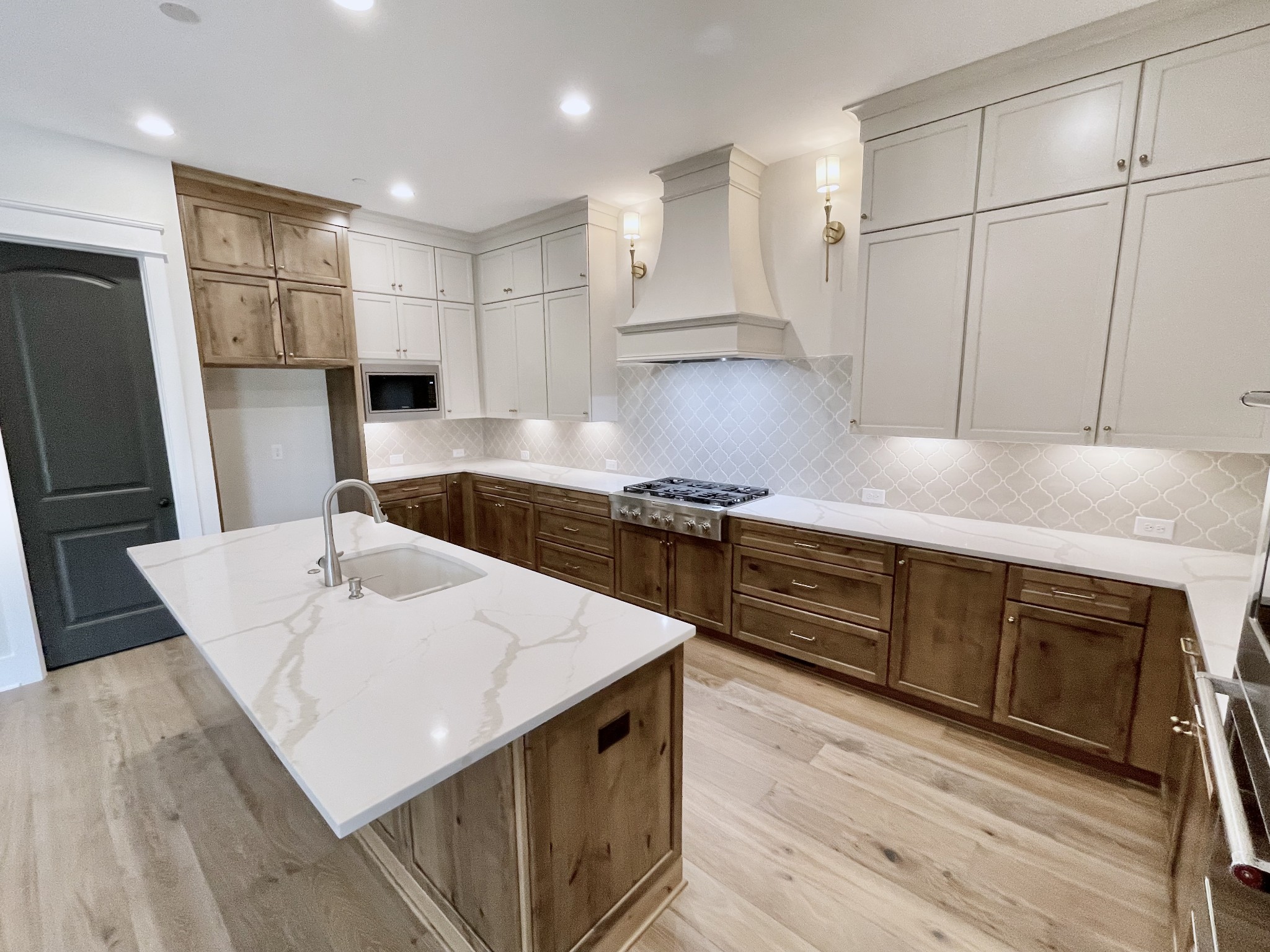 9926 Maupin Road Brentwood, TN 37027 - Photo 20 of 88 a kitchen with stainless steel appliances granite countertop a sink stove and refrigerator