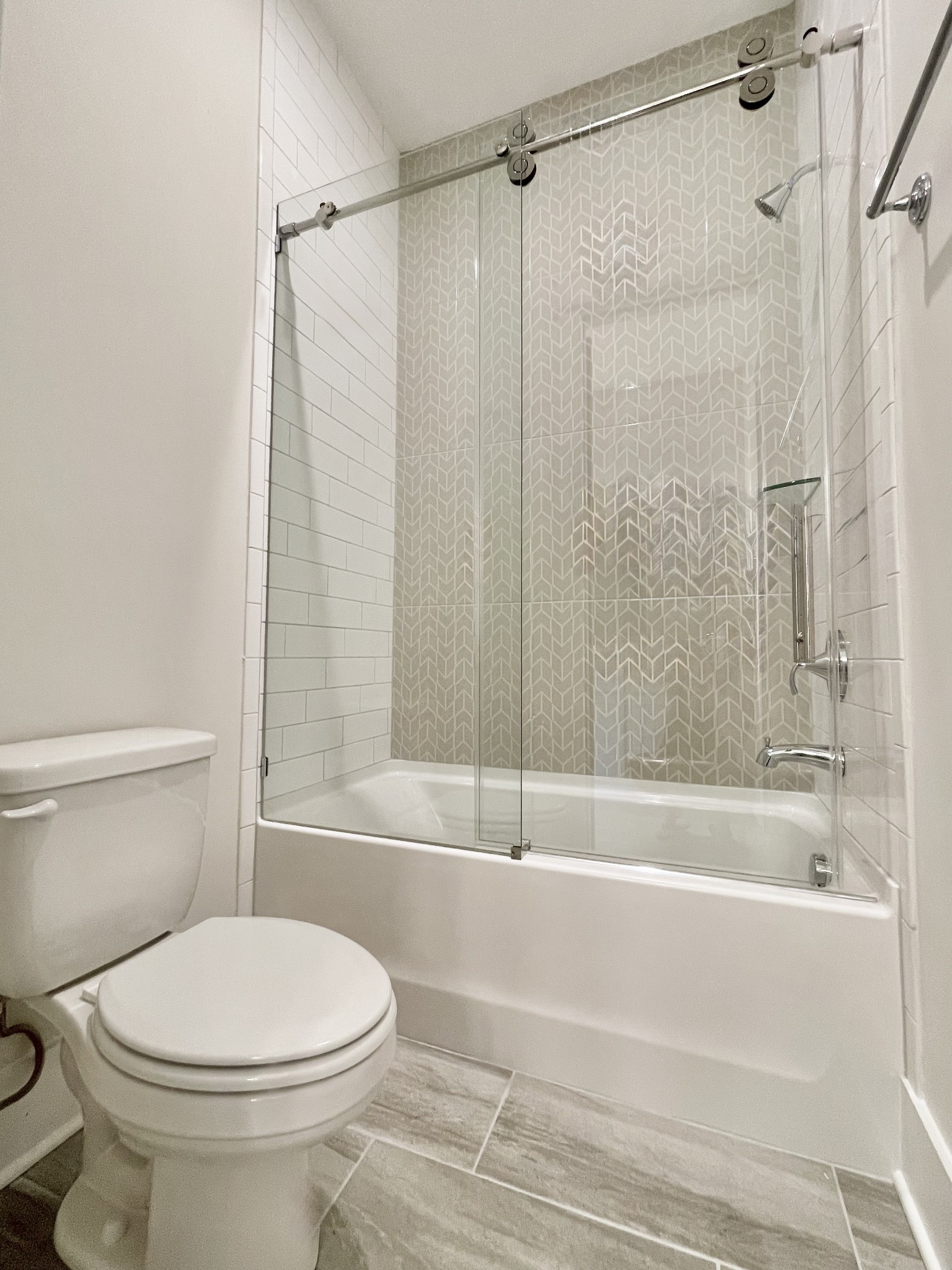 9926 Maupin Road Brentwood, TN 37027 - Photo 42 of 88 a bathroom with a toilet and a shower